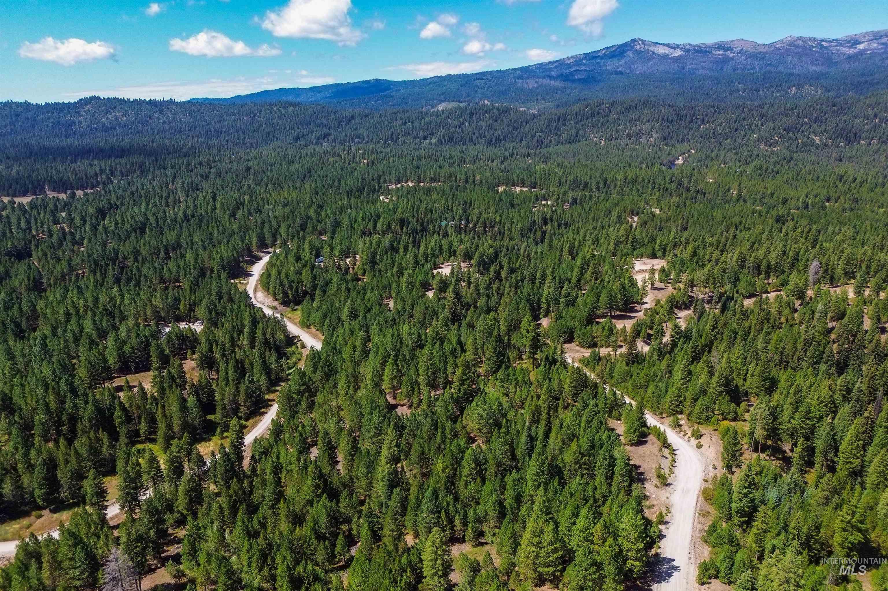 47 Coit Drive Cascade, ID 83611 - Photo 17 of 20 Aerial view of property's location featuring a mountainous background