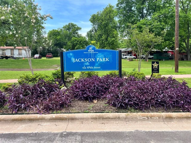 a sign on the side of the road