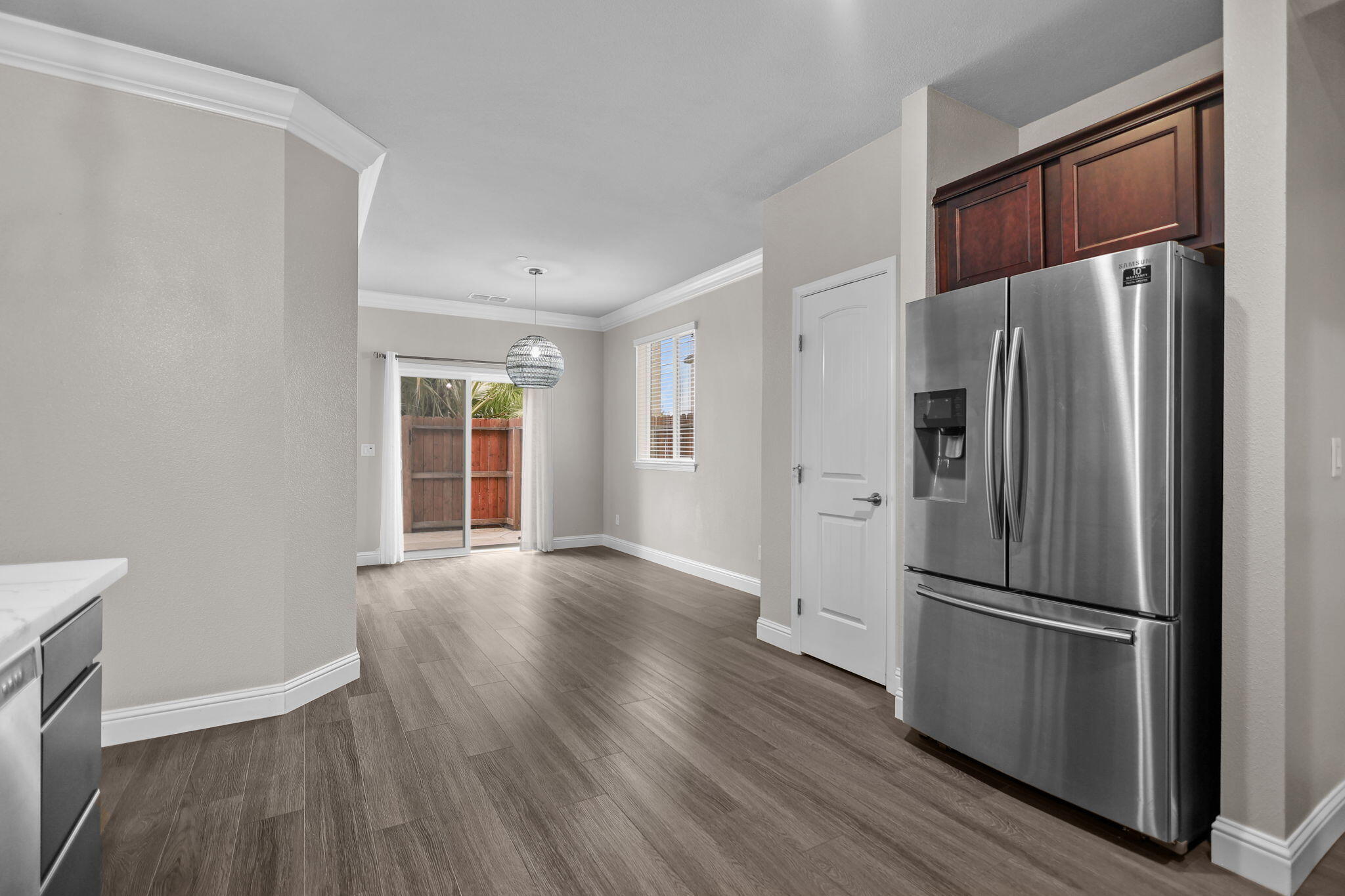 866 Congaree Lane Redding, CA 96001 - Photo 5 of 17 a metallic refrigerator freezer sitting in a kitchen
