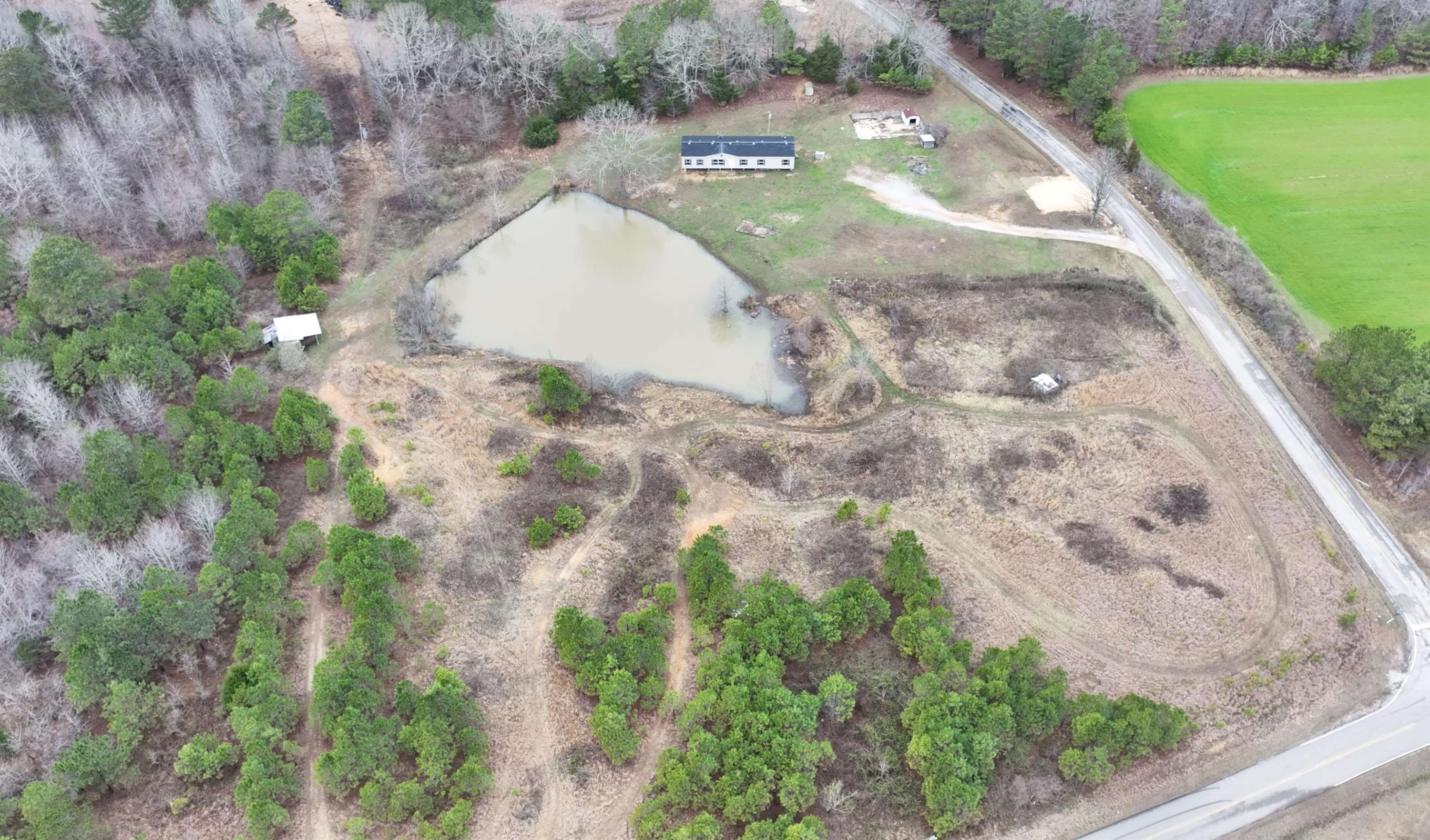 47 Wilkins Road Huron, TN 38345 - Photo 3 of 29 a view of a backyard