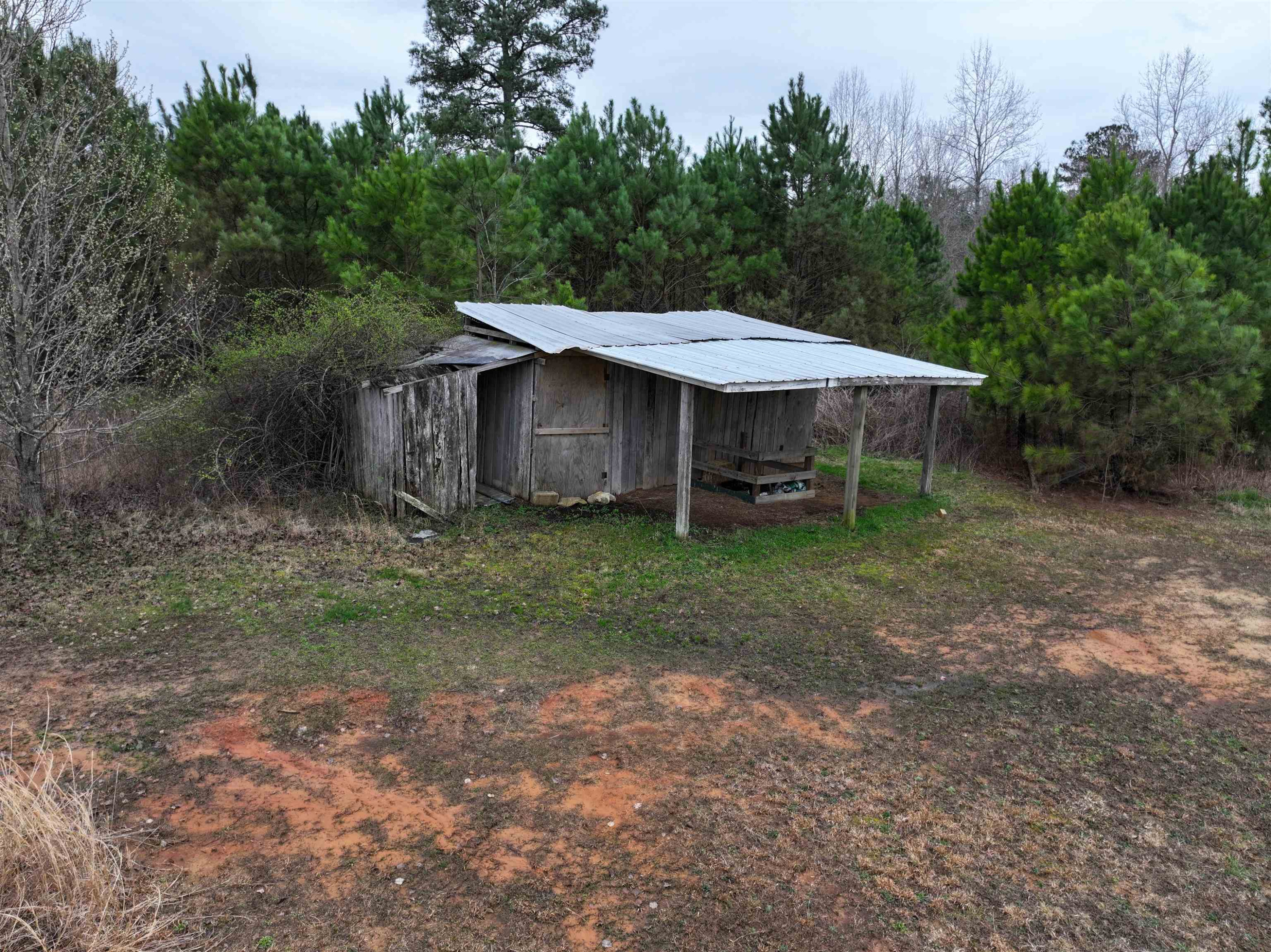 47 Wilkins Road Huron, TN 38345 - Photo 9 of 29 a view of a house with yard and sitting area