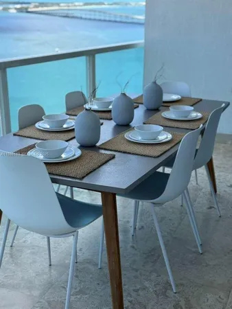 a view of living room filled with furniture