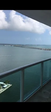 a view of a lake from a balcony