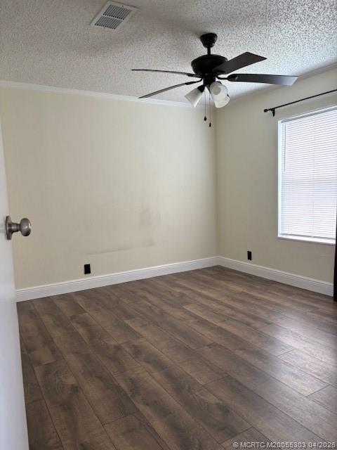 410 Southwest 134th Way Davie, FL 33325 - Photo 6 of 8 a view of a room with a hardwood floor and a ceiling fan