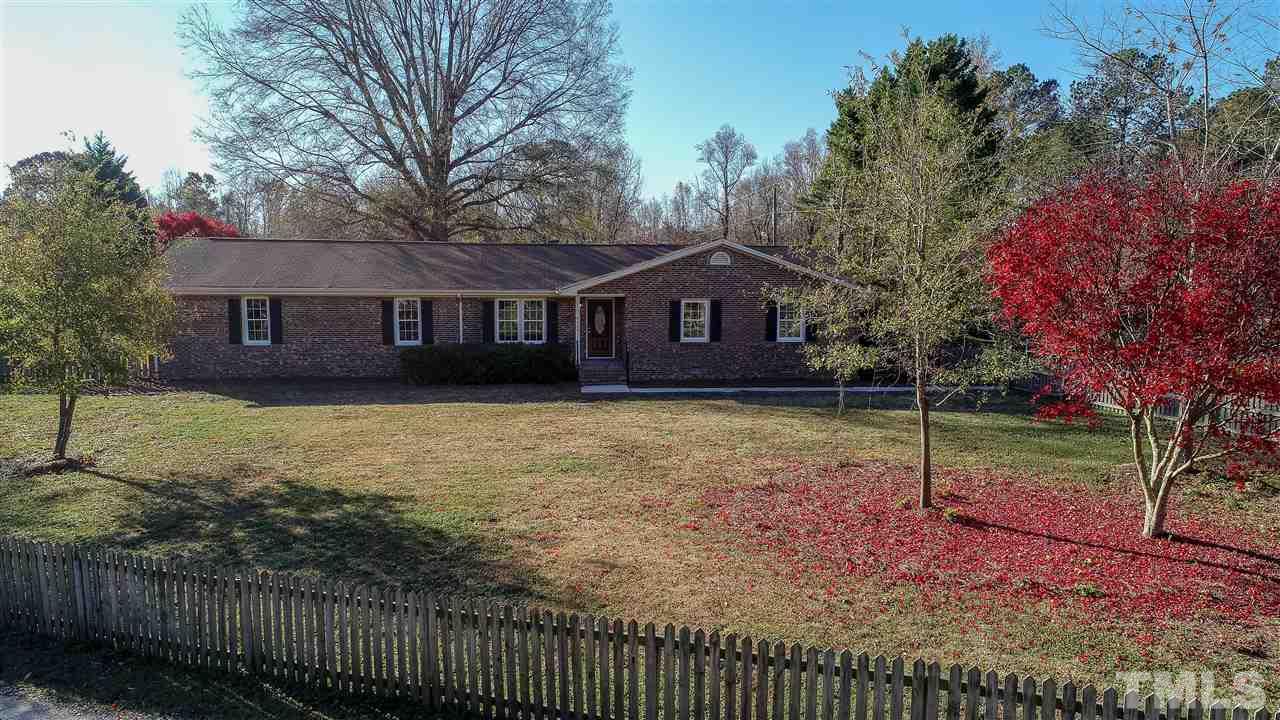 6024 Stancil Farm Road Raleigh, NC 27603 - Photo 11 of 23 a view of a house with a yard