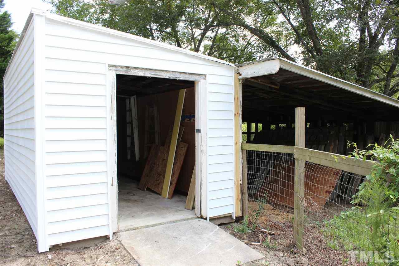 6024 Stancil Farm Road Raleigh, NC 27603 - Photo 20 of 23 a view of house with a outdoor space
