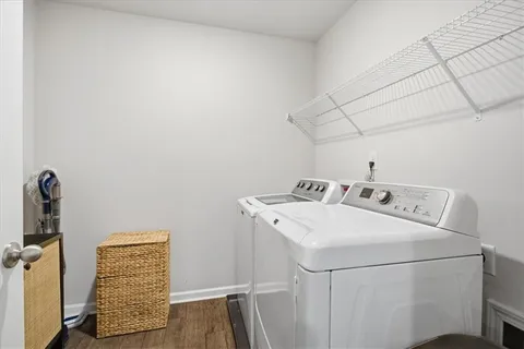 a utility room with dryer and washer