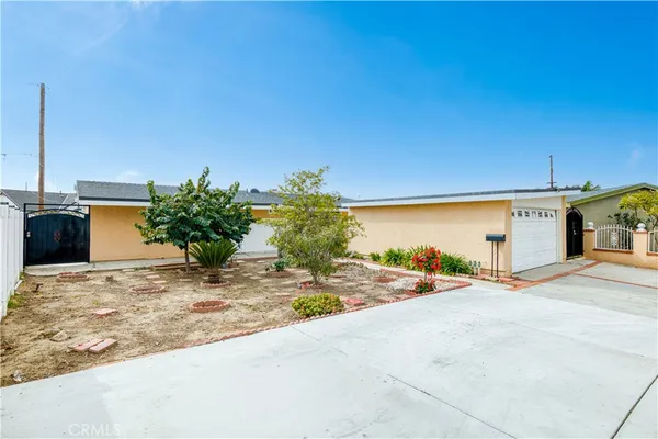 a view of a backyard of a house