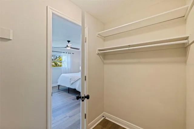 a view of a patio with a table and chairs