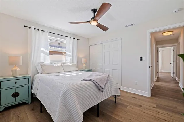 a bathroom with a tub a sink and a shower