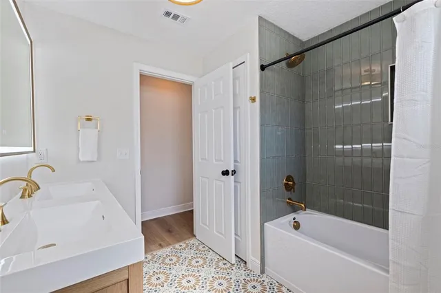a view of a livingroom with wooden floor