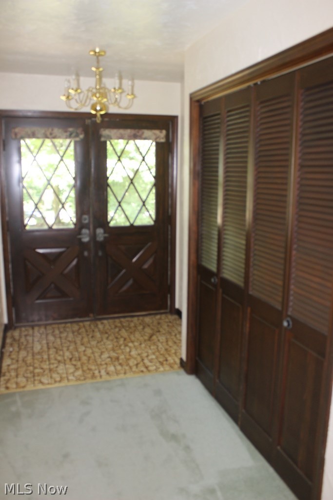 444 Stoner Road Clinton, OH 44216 - Photo 9 of 25 Foyer w/ceramic floor & double front door*