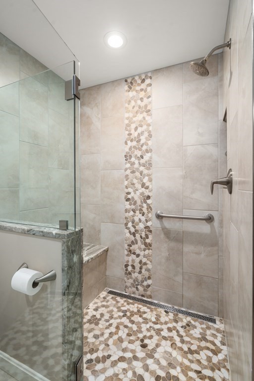 1 Pickwick Way, Unit 1 Wayland, MA 01778 - Photo 15 of 32 a bathroom with a shower
