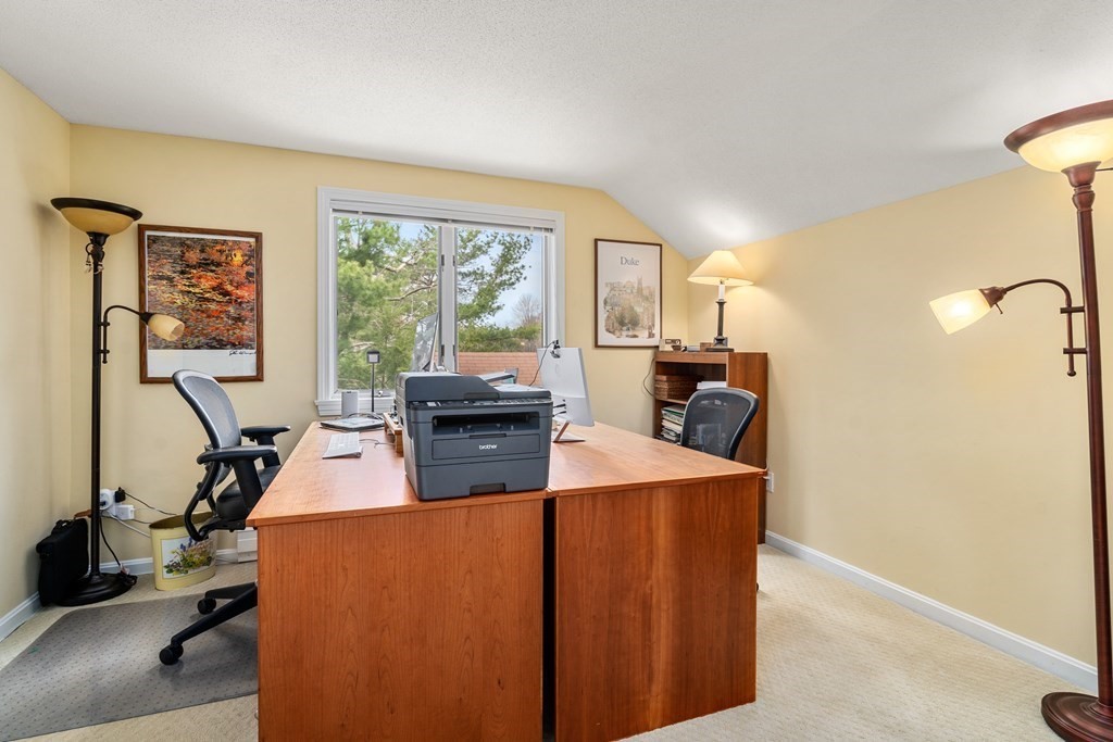 1 Pickwick Way, Unit 1 Wayland, MA 01778 - Photo 18 of 32 a view of a living room and dining room