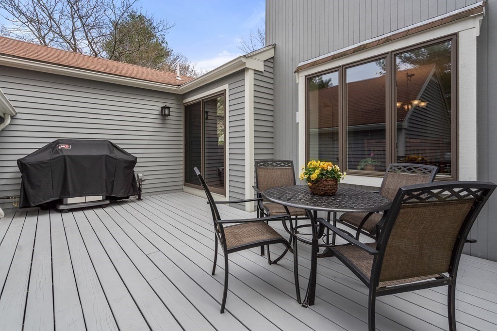 1 Pickwick Way, Unit 1 Wayland, MA 01778 - Photo 28 of 32 a house view with a seating space