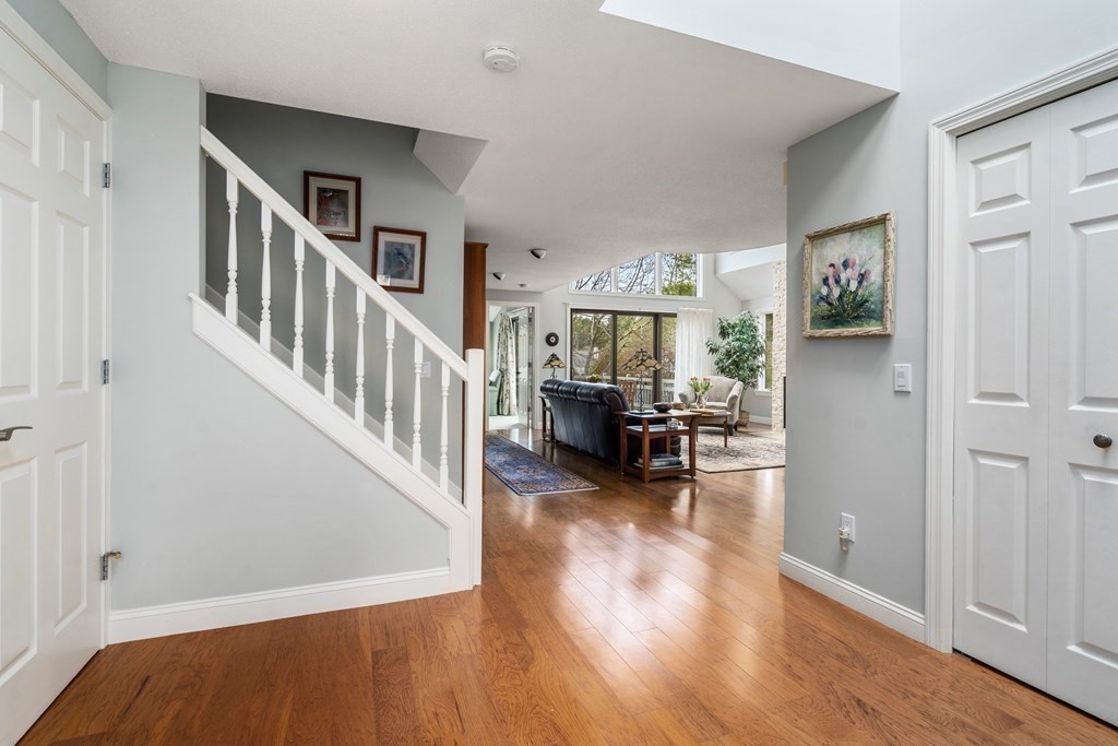 1 Pickwick Way, Unit 1 Wayland, MA 01778 - Photo 4 of 32 a view of a livingroom with furniture and workspace