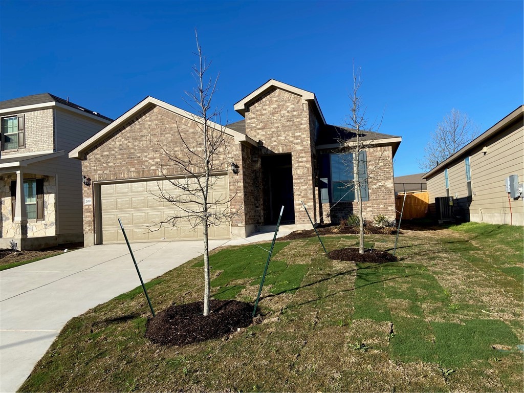 200 Kildeer Pass Jarrell, TX 76537 - Photo 1 of 27 a view of a house with backyard