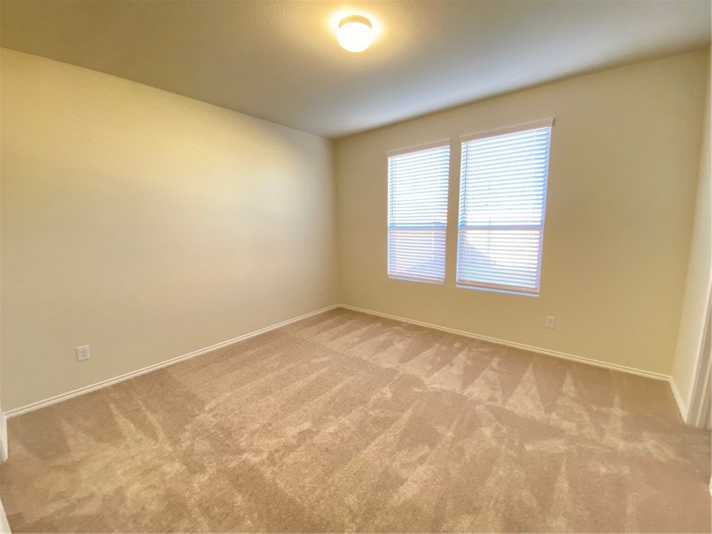 200 Kildeer Pass Jarrell, TX 76537 - Photo 14 of 27 an empty room with a window