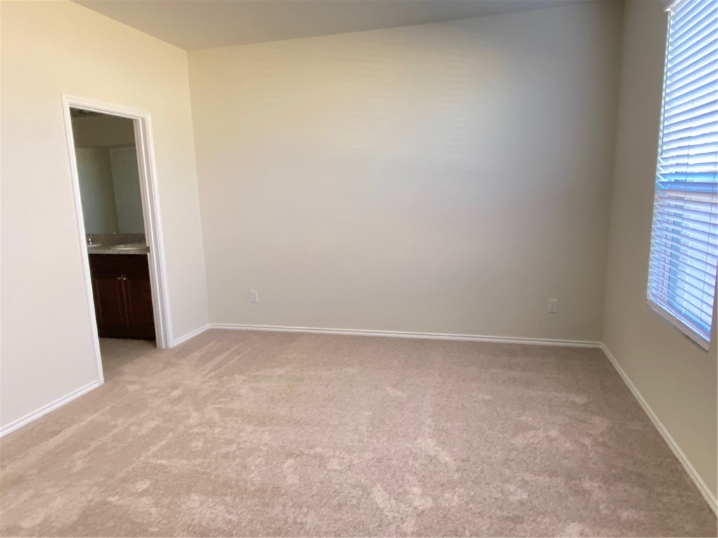 200 Kildeer Pass Jarrell, TX 76537 - Photo 15 of 27 an empty room with windows