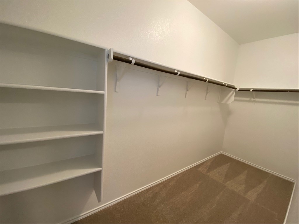 200 Kildeer Pass Jarrell, TX 76537 - Photo 16 of 27 a view of an empty walk in closet