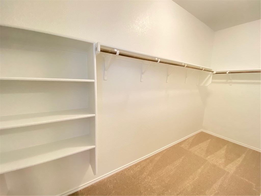 200 Kildeer Pass Jarrell, TX 76537 - Photo 17 of 27 a view of an empty walk in closet