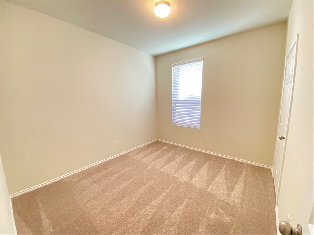 200 Kildeer Pass Jarrell, TX 76537 - Photo 20 of 27 a view of an empty room and window