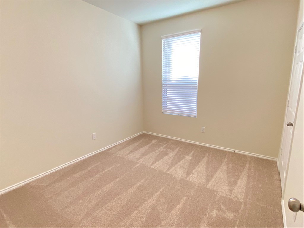 200 Kildeer Pass Jarrell, TX 76537 - Photo 21 of 27 an empty room with a window