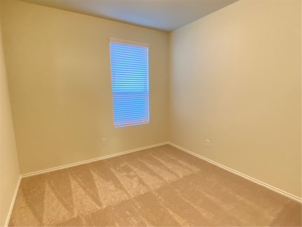 200 Kildeer Pass Jarrell, TX 76537 - Photo 23 of 27 a view of an empty room with a window