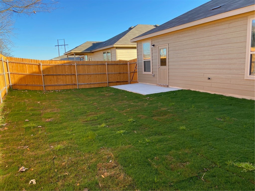 200 Kildeer Pass Jarrell, TX 76537 - Photo 25 of 27 a view of a backyard of the house