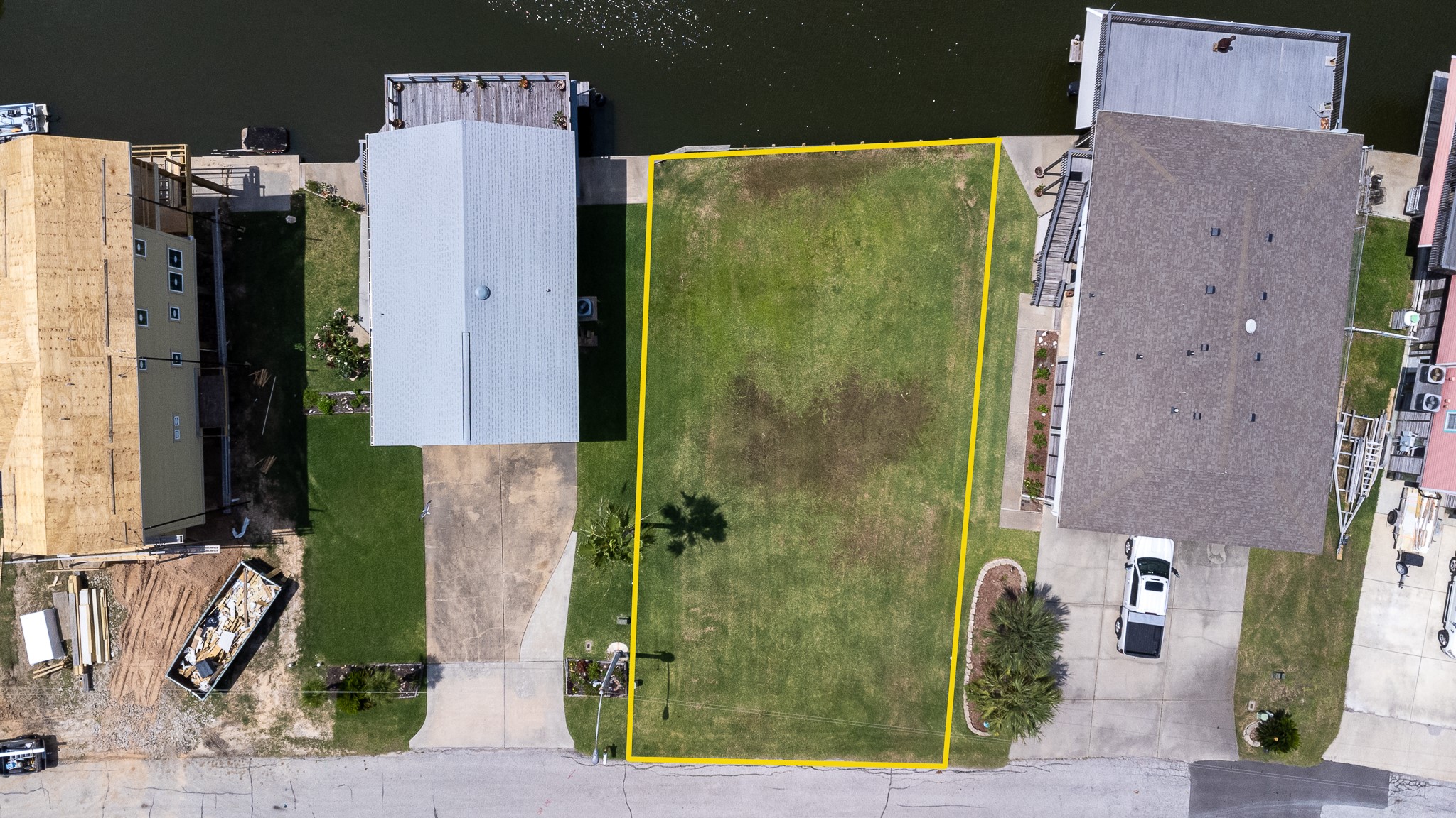 Lot 46 Bamboo Road Tiki Island, TX 77554 - Photo 13 of 23 aerial view of a house with a backyard