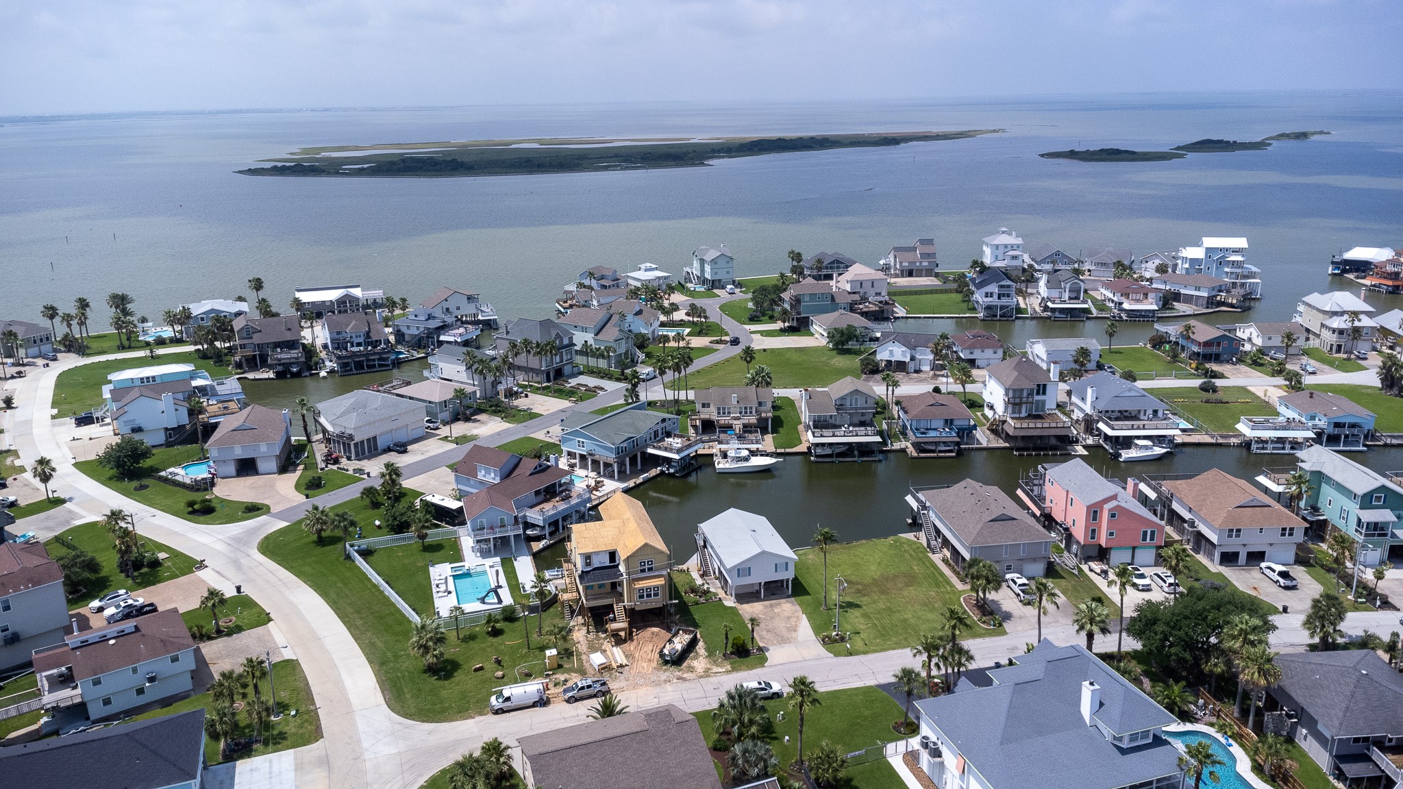 Lot 46 Bamboo Road Tiki Island, TX 77554 - Photo 14 of 23 an aerial view of ocean and houses with outdoor space