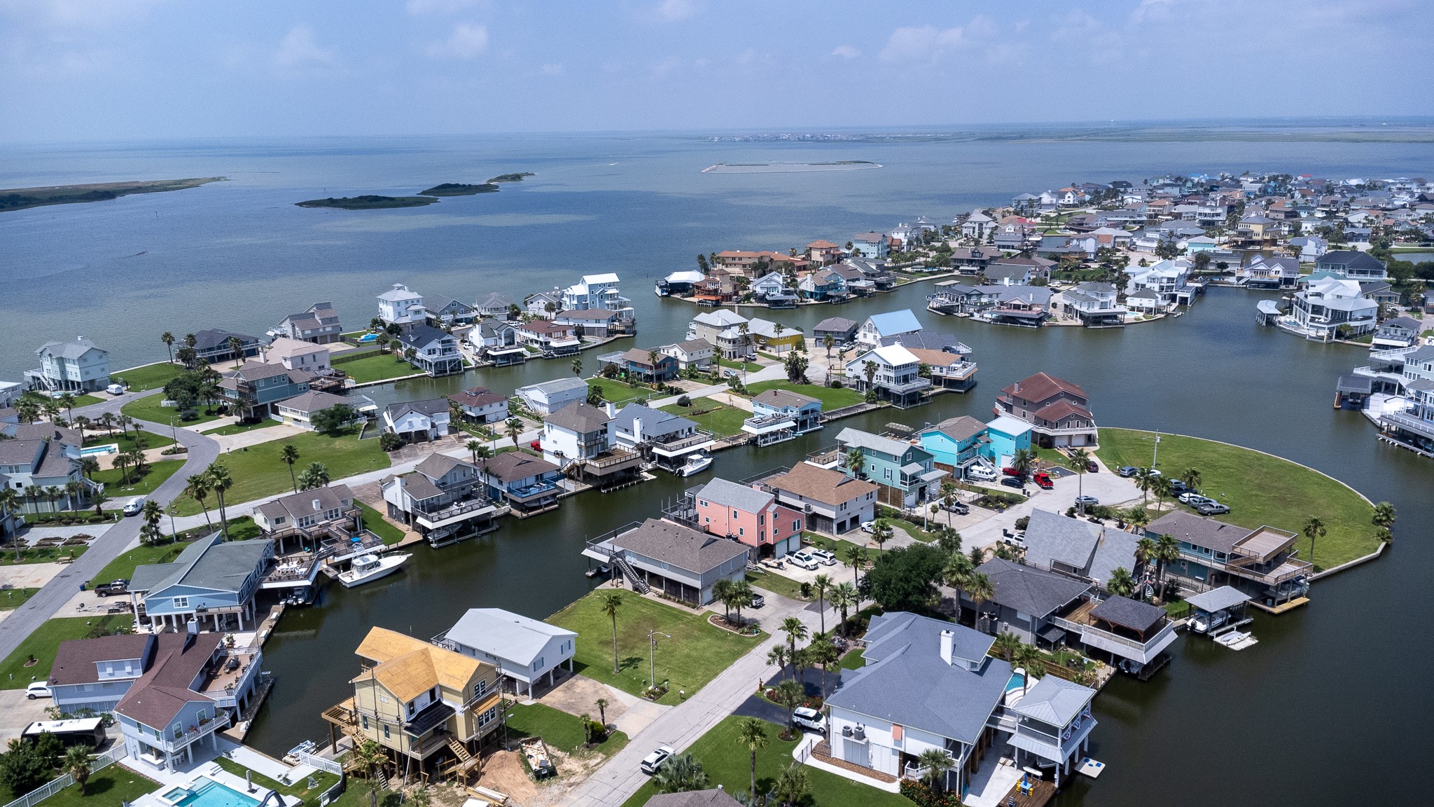 Lot 46 Bamboo Road Tiki Island, TX 77554 - Photo 16 of 23 an aerial view of a house with a lake view