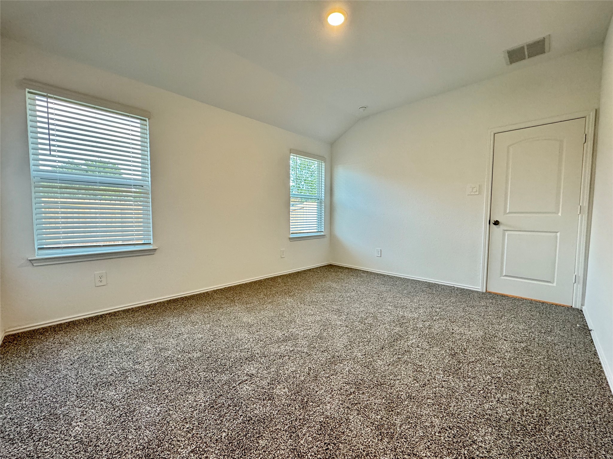 1746 Windstone Ridge Drive Houston, TX 77014 - Photo 6 of 19 Your spacious primary bedroom with plenty of natural light.