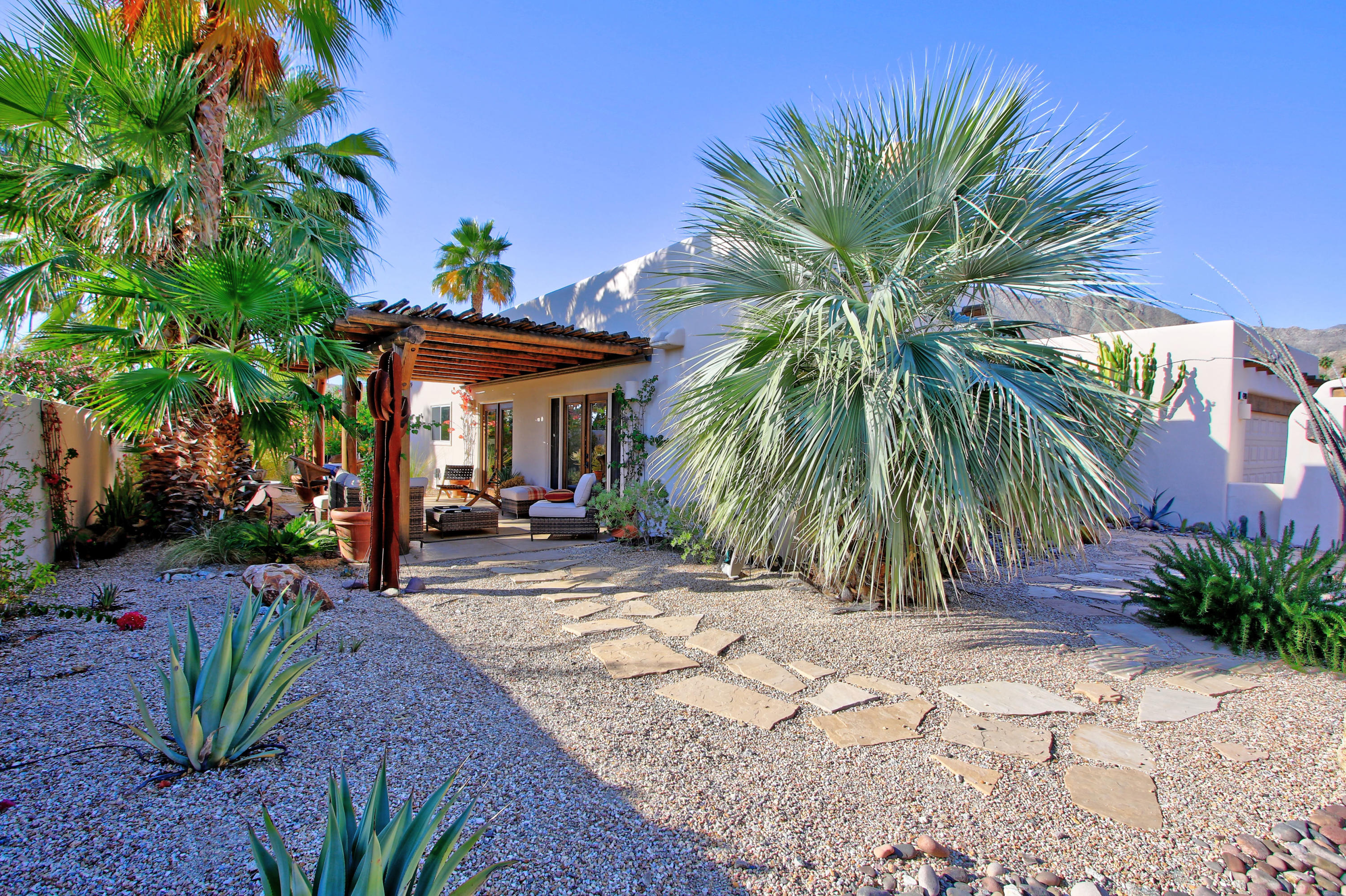42490 Dunes View Road Rancho Mirage, CA 92270 - Photo 2 of 60 a view of a house with a patio