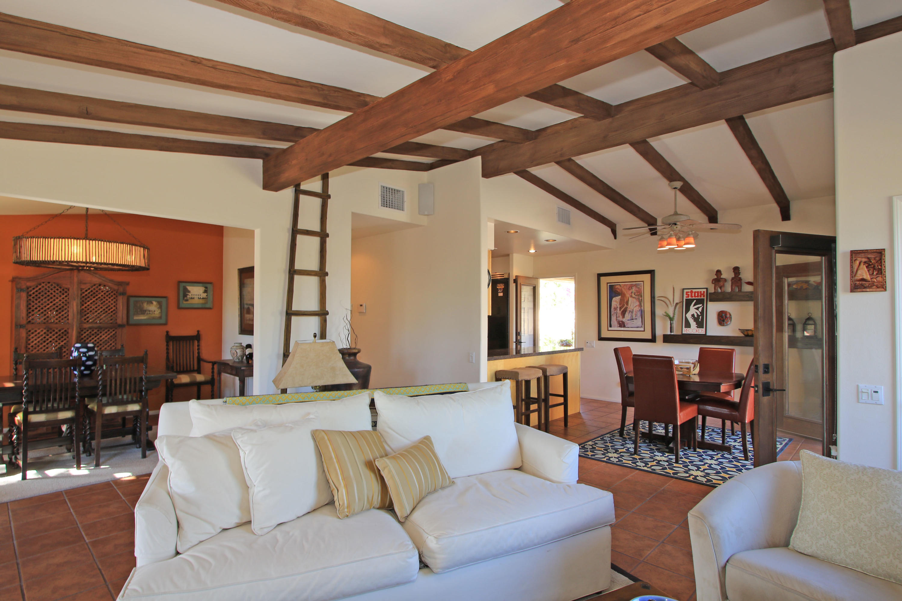 42490 Dunes View Road Rancho Mirage, CA 92270 - Photo 24 of 60 a living room with furniture and wooden floors