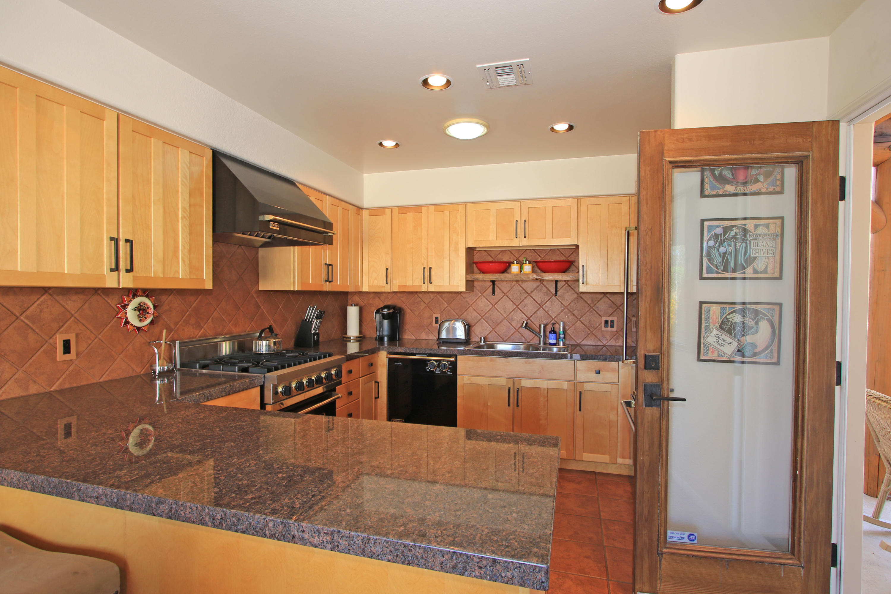42490 Dunes View Road Rancho Mirage, CA 92270 - Photo 25 of 60 a kitchen with lots of counter top space