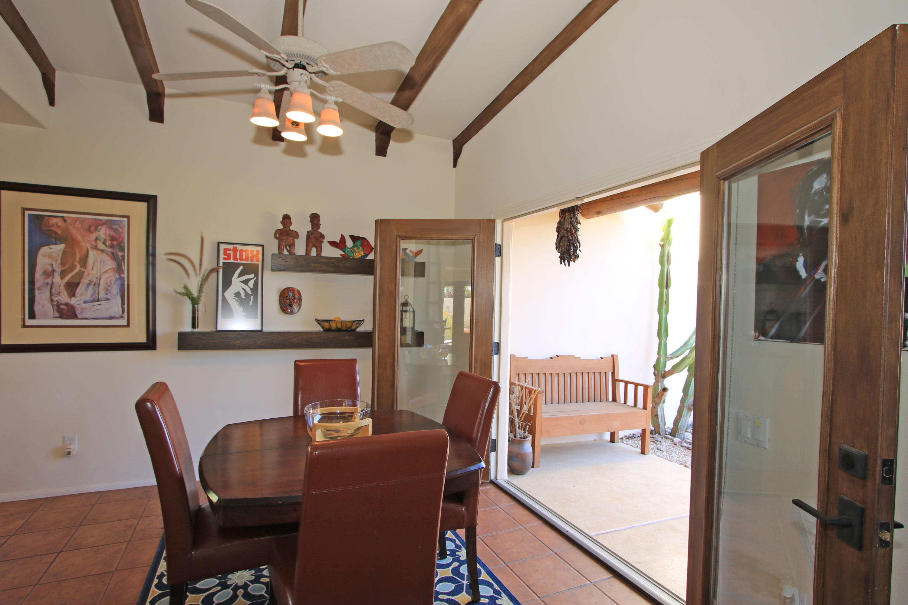 42490 Dunes View Road Rancho Mirage, CA 92270 - Photo 28 of 60 a dining room with furniture and window
