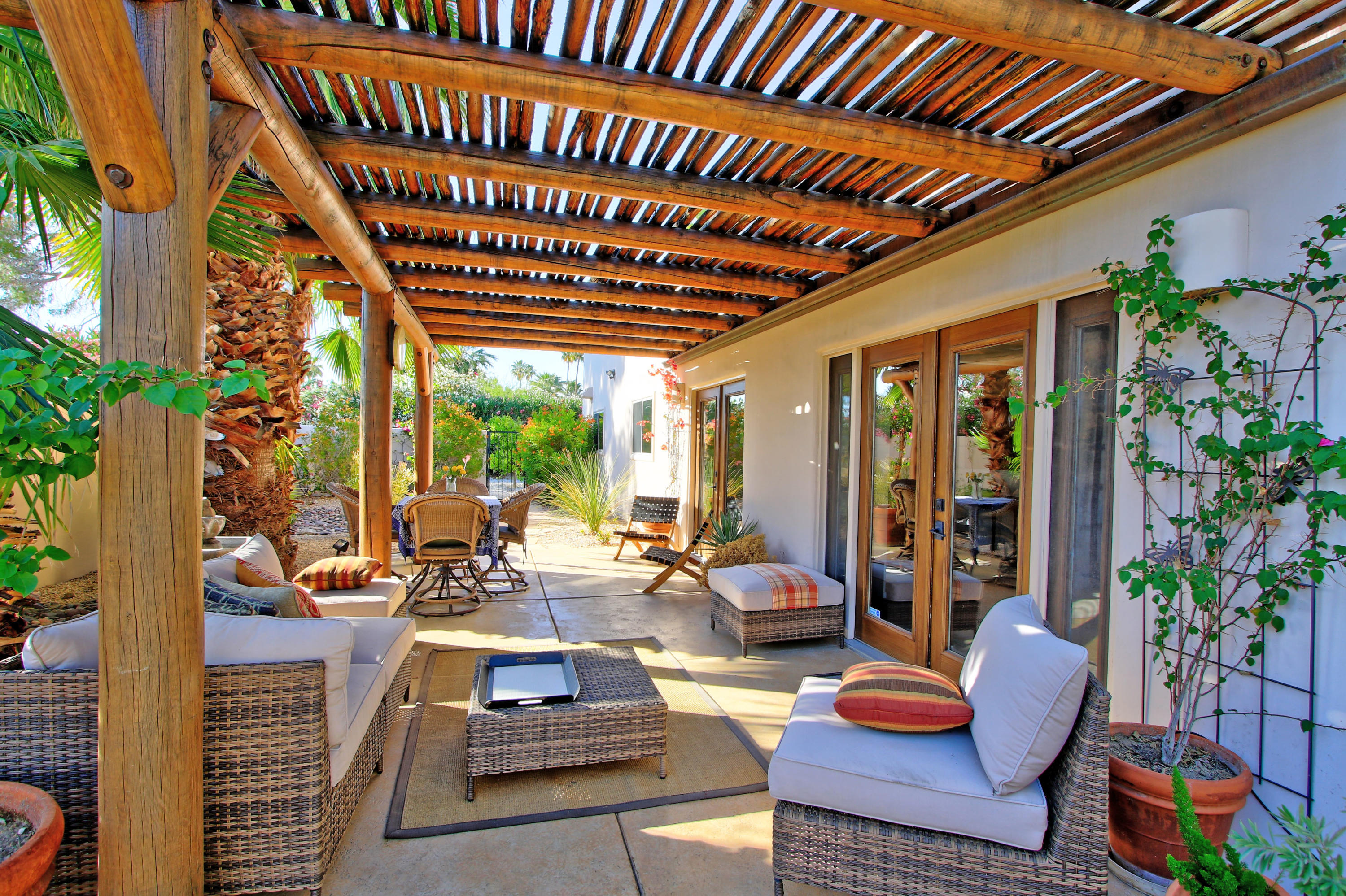 42490 Dunes View Road Rancho Mirage, CA 92270 - Photo 3 of 60 a outdoor living space with furniture and garden view