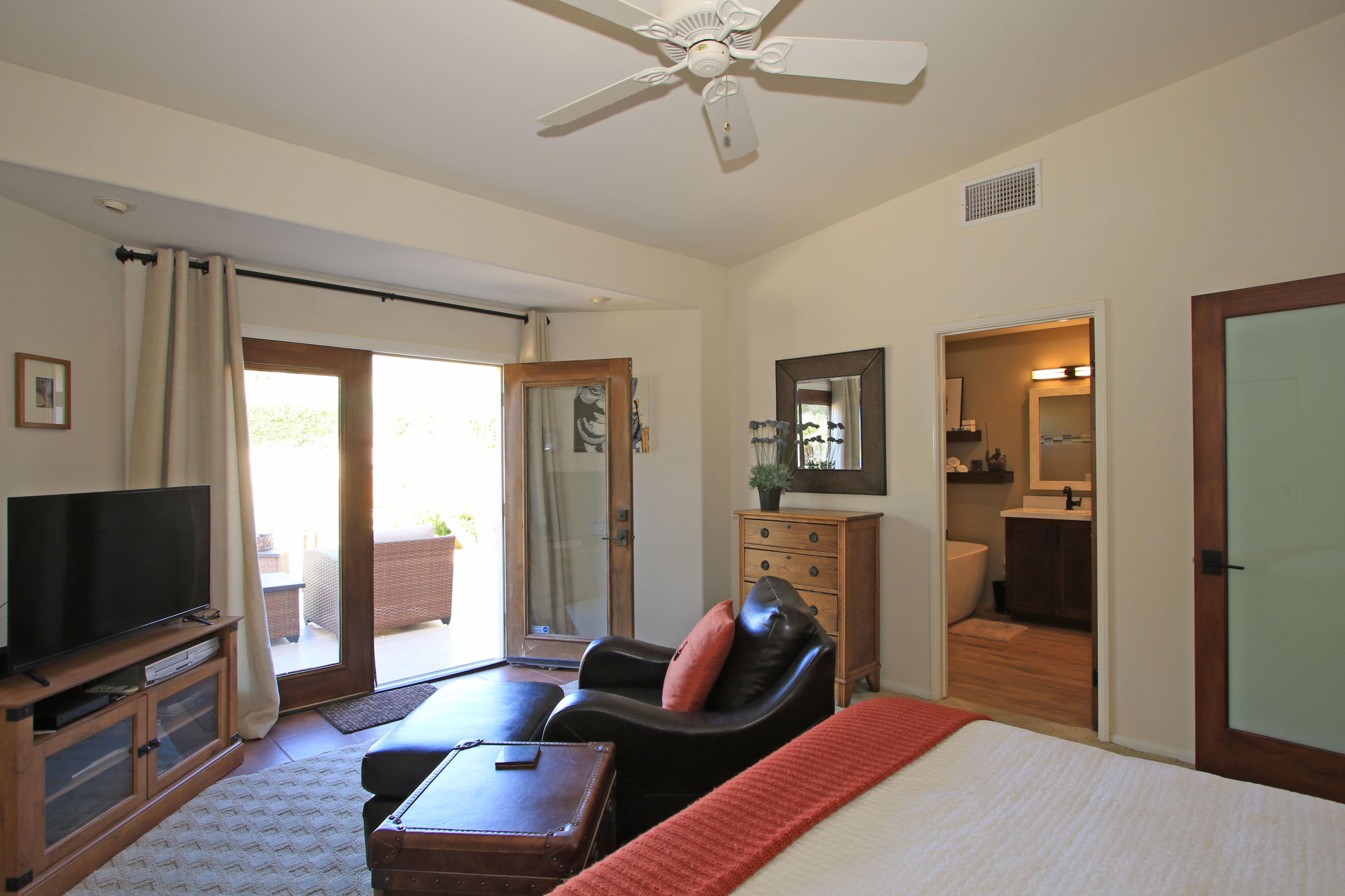 42490 Dunes View Road Rancho Mirage, CA 92270 - Photo 33 of 60 a living room with furniture and a flat screen tv