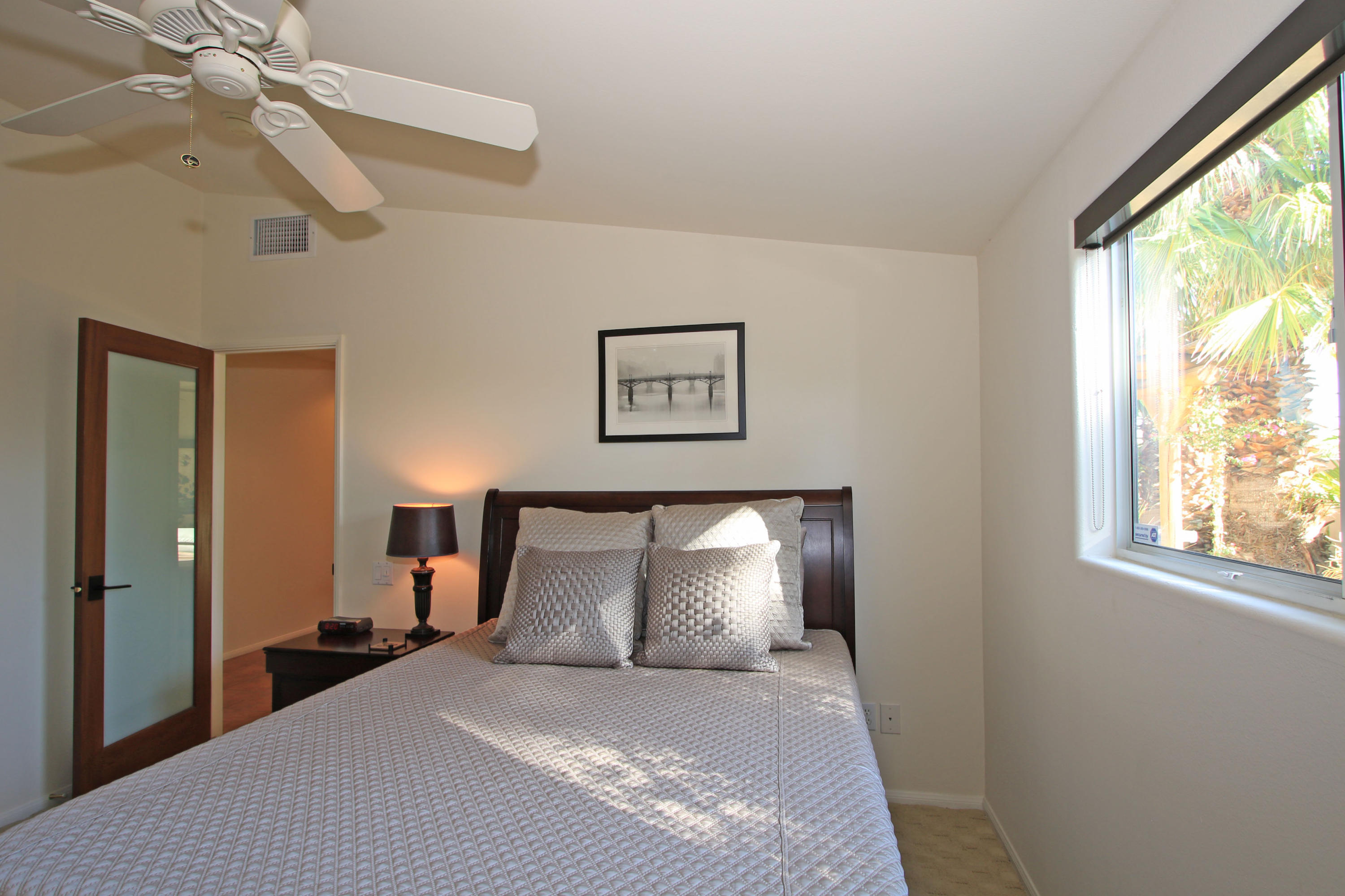 42490 Dunes View Road Rancho Mirage, CA 92270 - Photo 43 of 60 a bedroom with a bed and a window