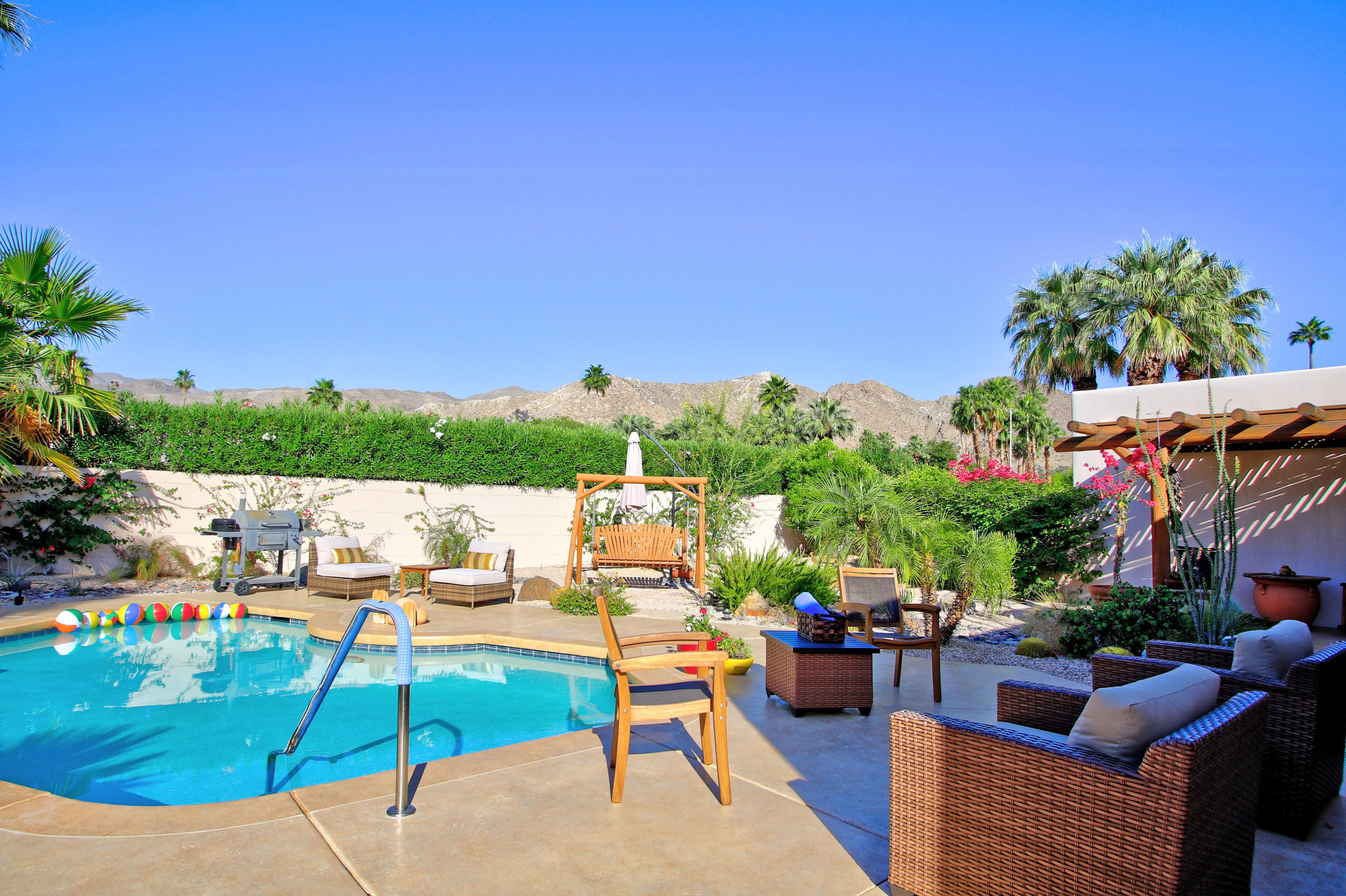 42490 Dunes View Road Rancho Mirage, CA 92270 - Photo 46 of 60 a view of a yard with furniture
