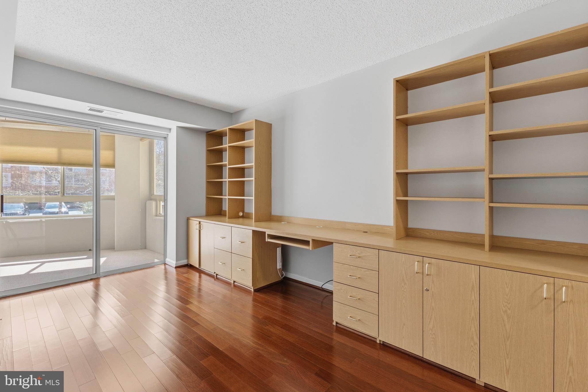 14801 Pennfield Circle, Unit 206 Silver Spring, MD 20906 - Photo 22 of 37 a room with natural light and wooden floor