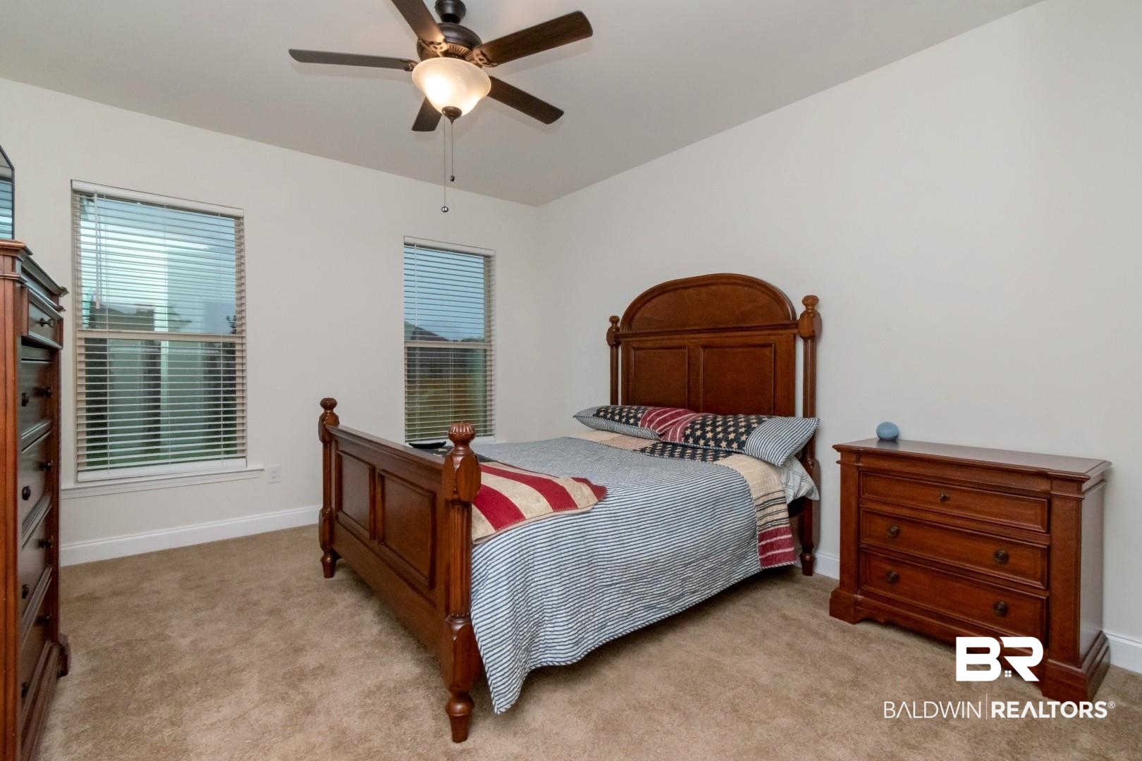 10714 Brodick Loop Spanish Fort, AL 36527 - Photo 15 of 26 Bedroom with light colored carpet and ceiling fan