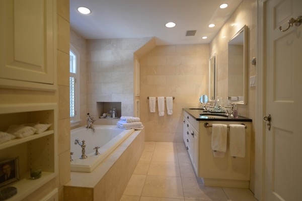 14 Old Town Road Wellesley, MA 02481 - Photo 14 of 17 a bathroom with a tub sink and mirror