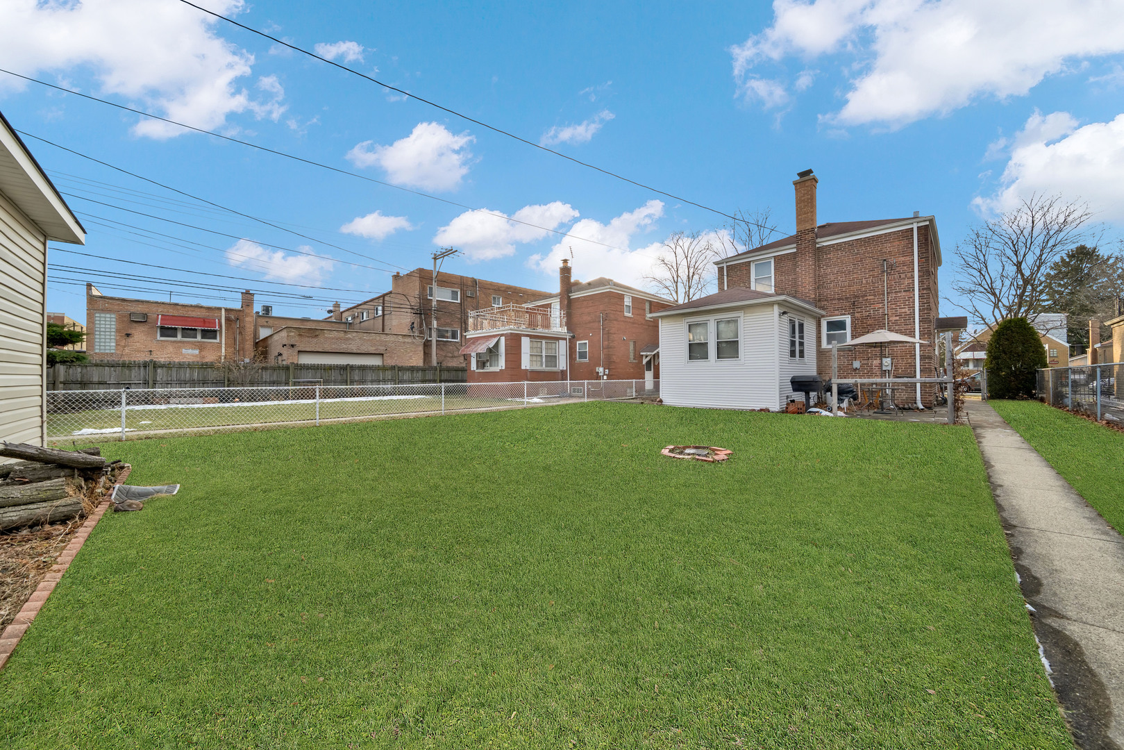 3431 South 58th Avenue Cicero, IL 60804 - Photo 17 of 17 a house view with a sitting space and garden view