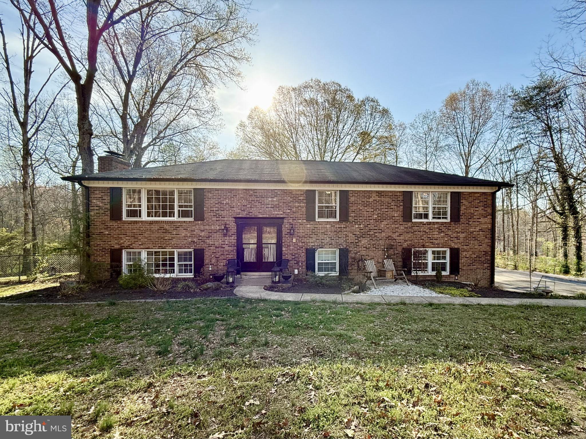 8 Rolling Road Stafford, VA 22556 - Photo 2 of 22 front view of a house with a yard