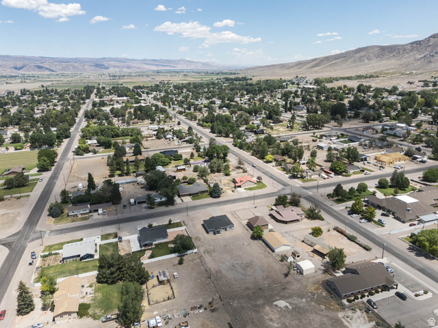 51 West 500 South Monroe, UT 84754 - Photo 37 of 41 Elevated aerial perspective showcasing a community with established tree canopies and residential structures