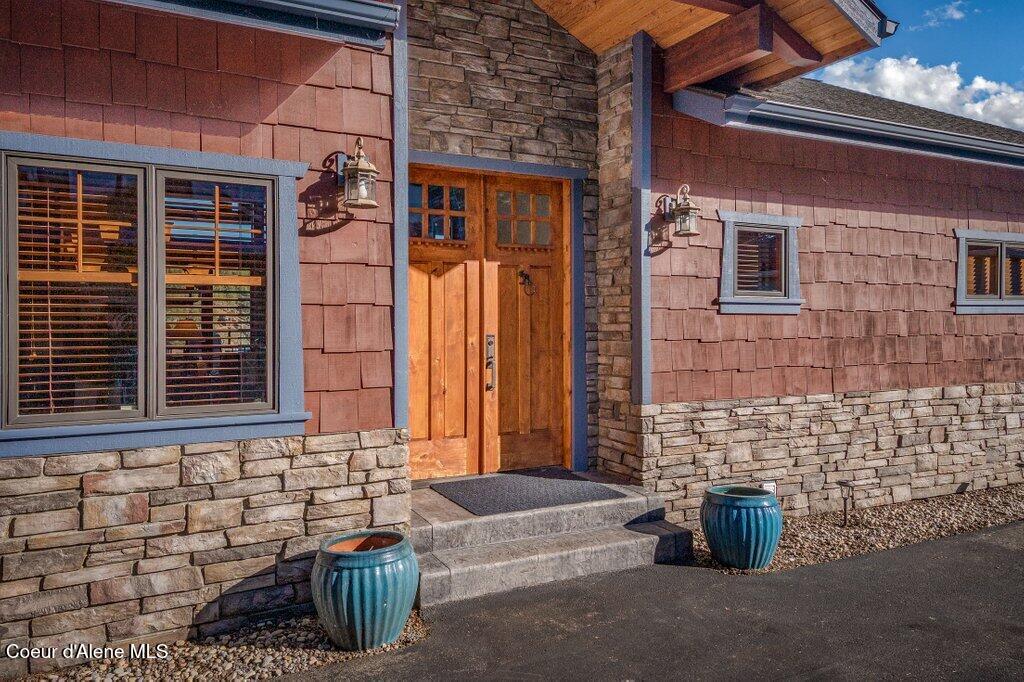 5071 South Fishhawk Court Harrison, ID 83833 - Photo 3 of 100 Custom with Shake Shingle and Stone