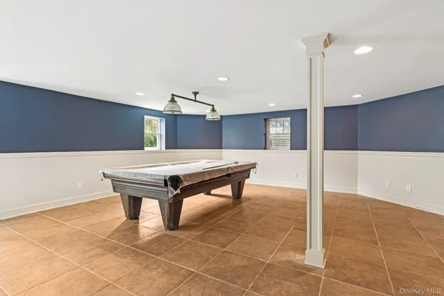 a view of a balcony with wooden floor