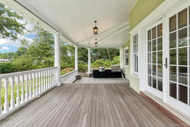 a view of a balcony with chairs